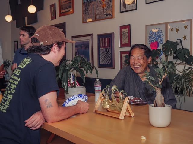 Guests talking together during a Rough Impact screening at Fancy Film