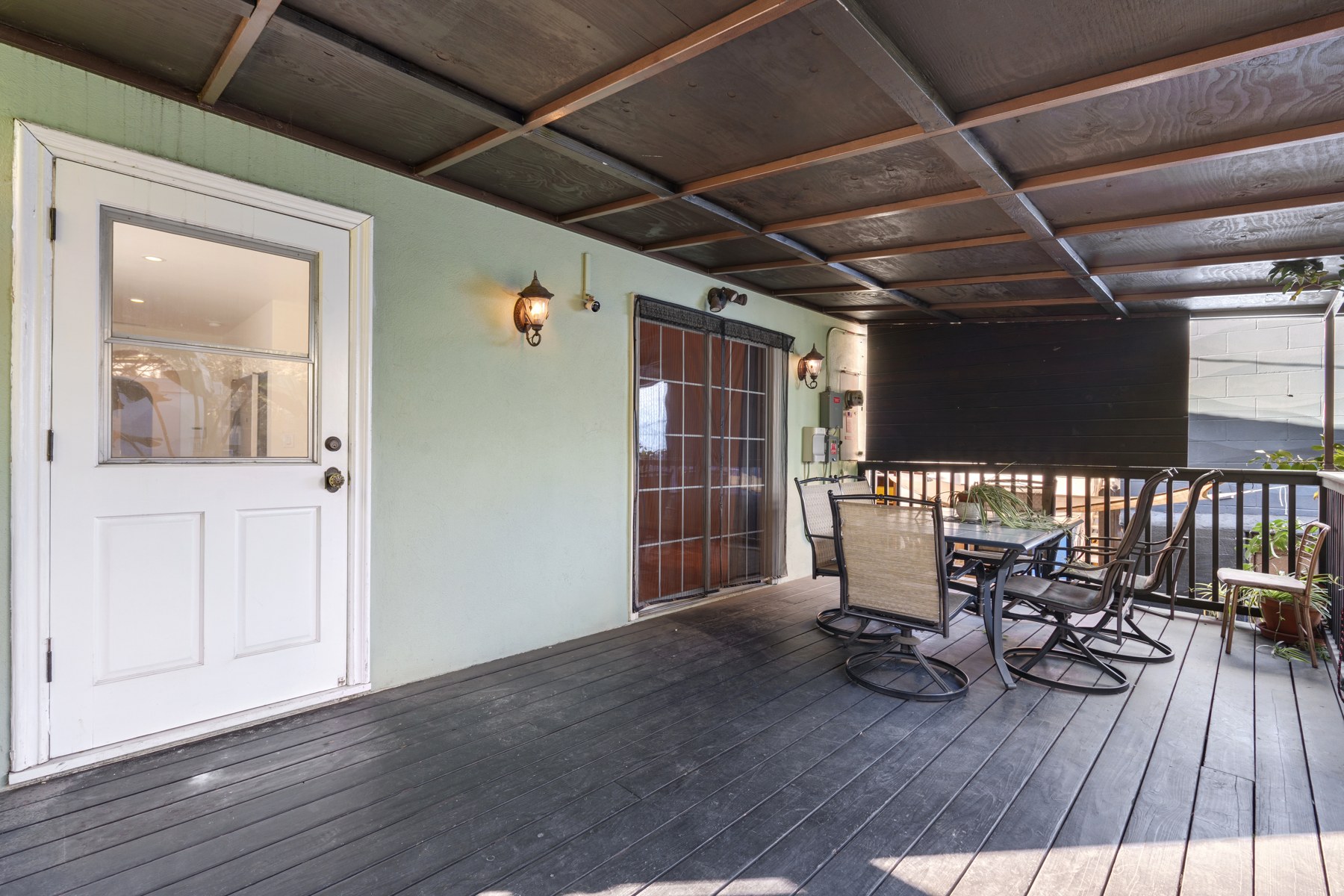 1020 Upstairs covered porch with outdoor seating