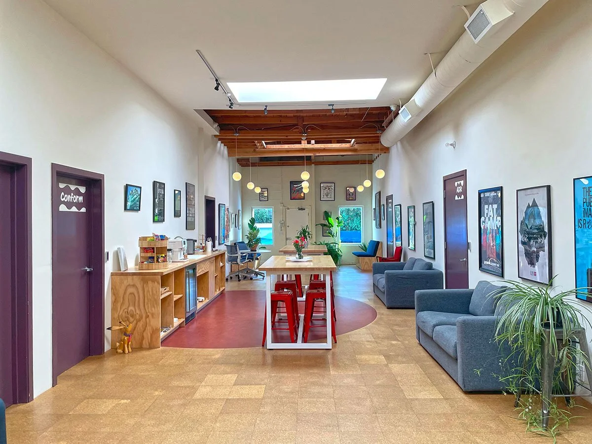 Fancy Film atrium with seating and interior landscaping