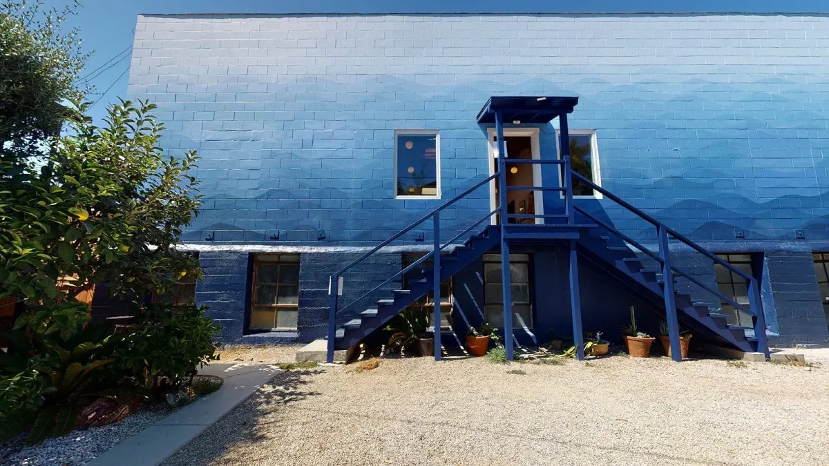 Blue staircase at the Fancy Film patio entrance
